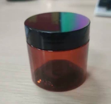 Afdichting van 100 ml plastic cosmetische pot met drukgevoelige pakking en op maat gemaakt drukwerk